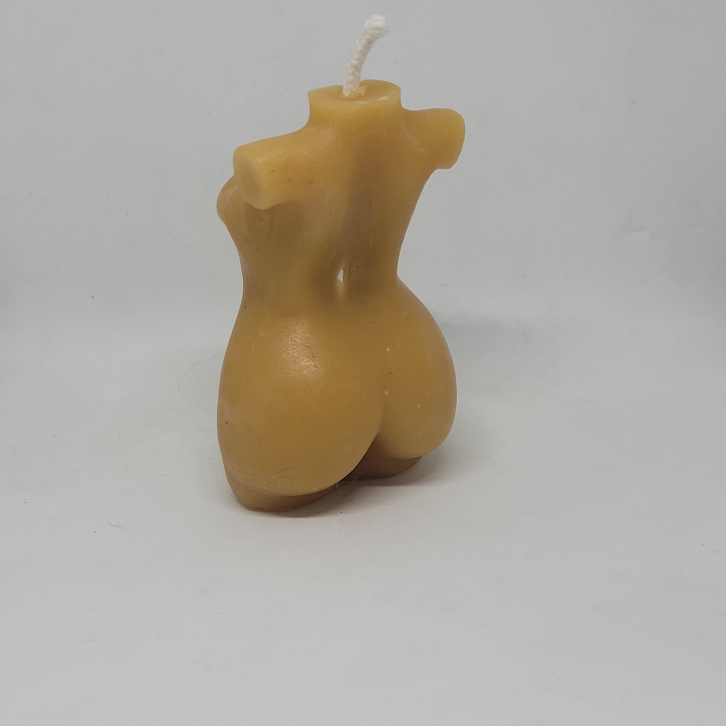 Female physique candle